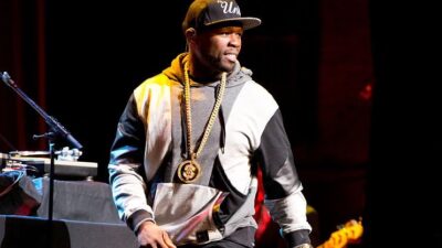 Rapper 50 Cent performs during the 4th Annual "Home For The Holidays" Benefit Concert at Beacon Theatre on December 6, 2014 in New York City