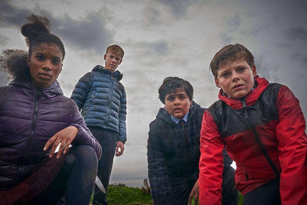 L-R: Rhianna Dorris, Tom Taylor, Dean Chaumoo, and Louis Ashbourne Serkis in The Kid Who Would Be King.