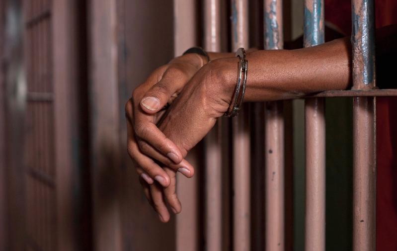 jail - black man-in-handcuffs1