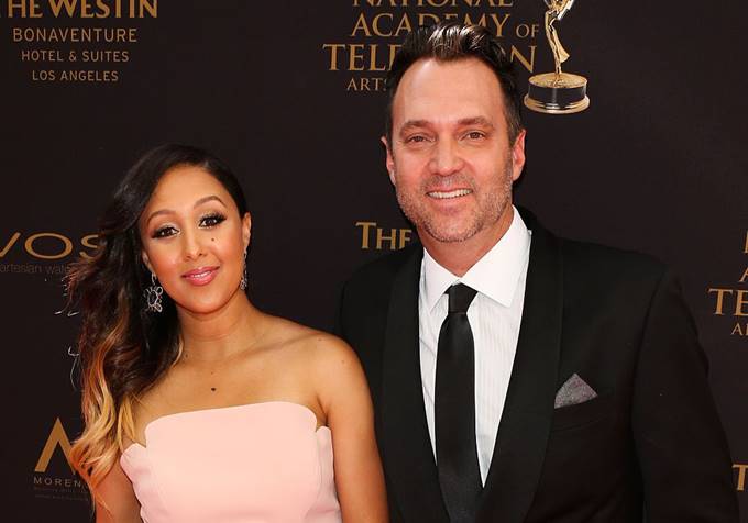 Tamera Mowry and her husband Adam Housley