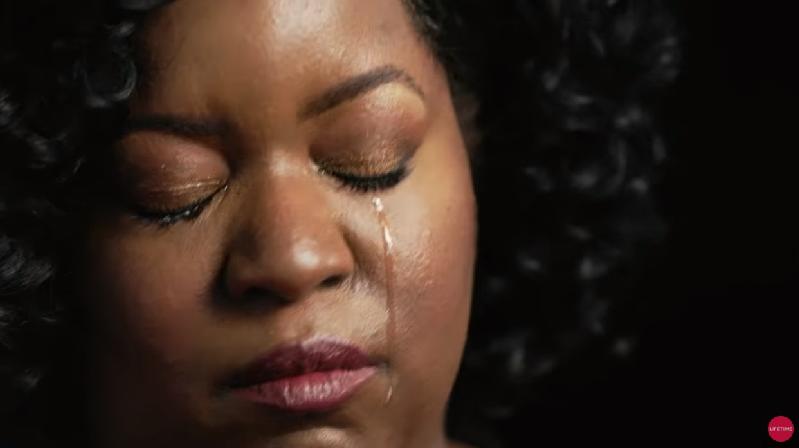 Surviving R. Kelly Pt 2 trailer  - woman crying (screenshot)