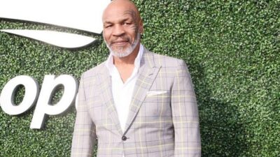 Mike Tyson in grey suit