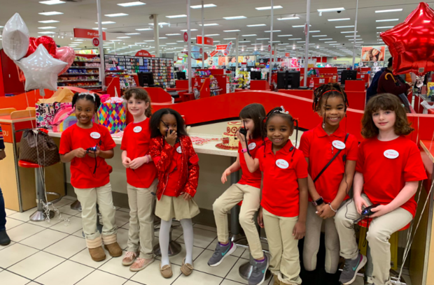 Little girl holds Birthday at Target, Complete with Mini Uniforms, Nametags & Walkie | EURweb