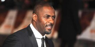 Idris Elba in black suit