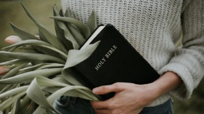 Easter - woman holding palms-tulips-bible