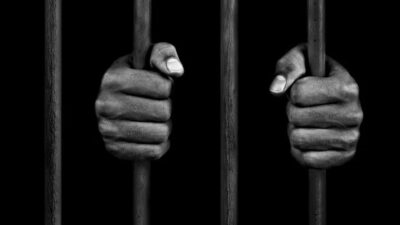prison bars - hands