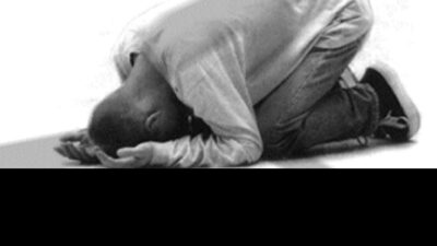 A man lays prostrate and wages war against hell - (google free to share and use)
