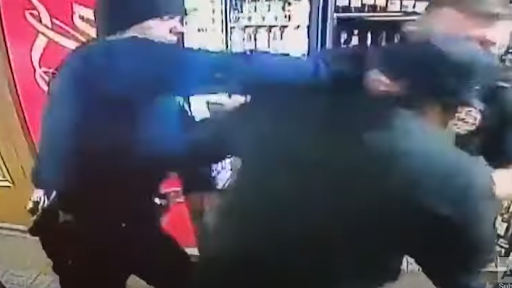 cop punches store owner