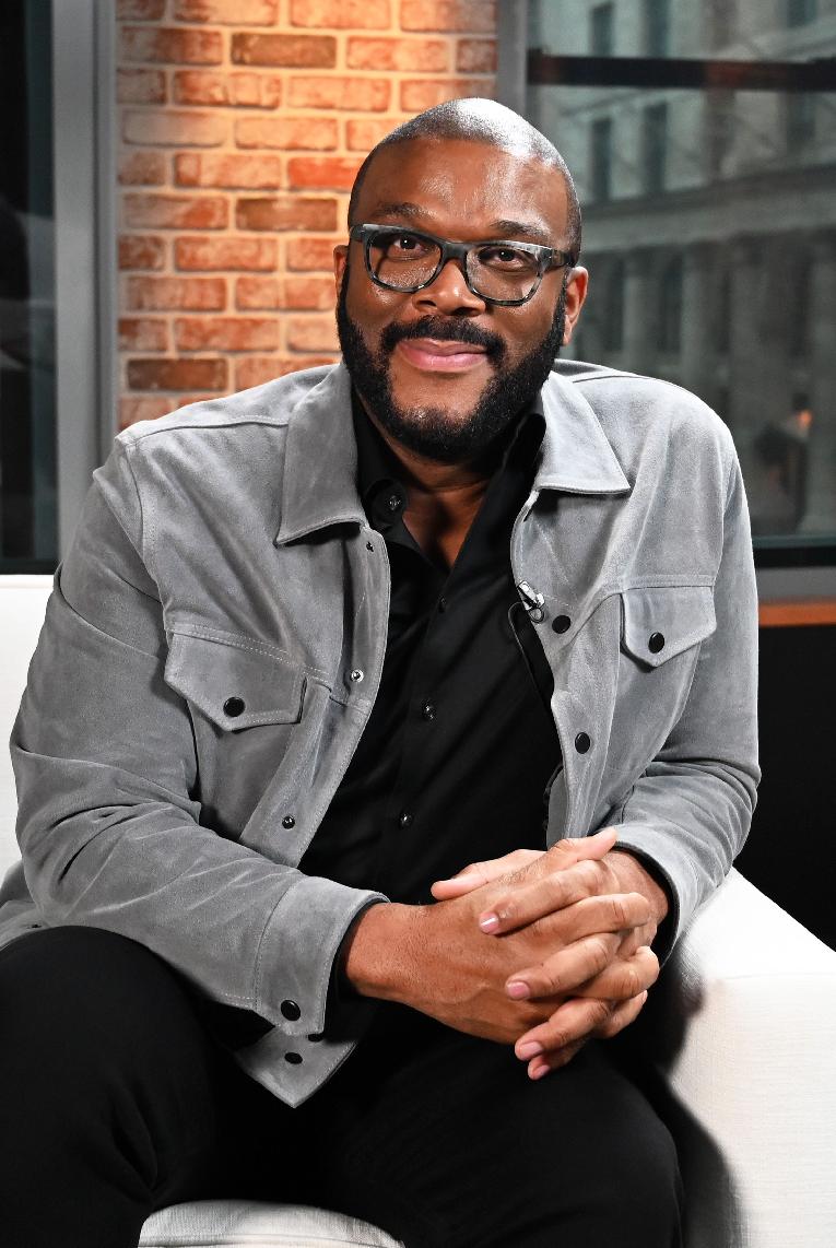 Tyler Perry (sitting - getty)
