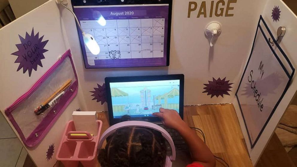 Angelina Harper, a special education teacher from Louisville, Kentucky, crafted work stations for each of her children, Aubrie, 8 and twins Paige and Peyton, 6.
