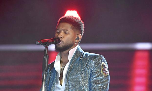 Usher performing1a - Getty