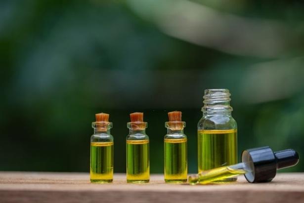 CBD oil in small bottles with applicator
