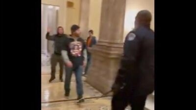 Black Capitol cop & MAGA-ite1a (Twitter screenshot)