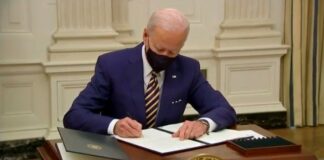 Joe Biden signing executive orders