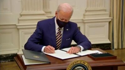 Joe Biden signing executive orders