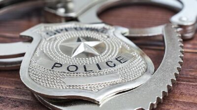 police badge - EURweb