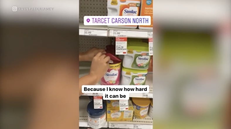 The video shows the couple slipping cash inside baby products at Target stores in Southern California