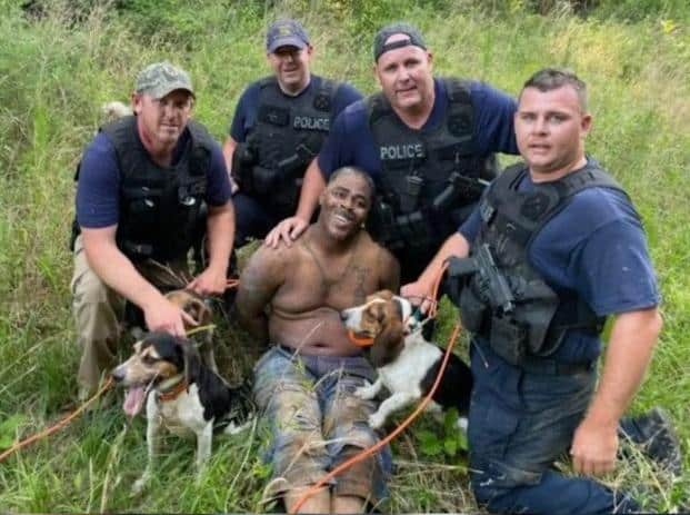 Mississippi cops Eric Boykn and dogs