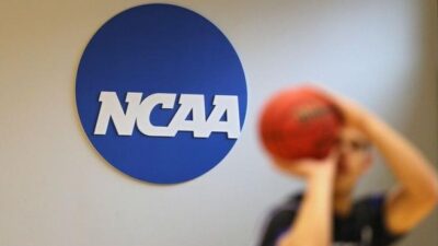 NCAA logo ( & someone shooting ball)