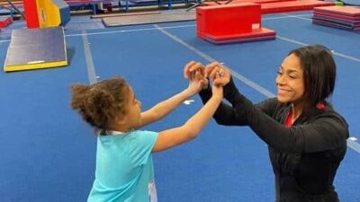 Dominique Dawes & little girl