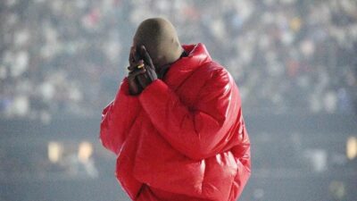 Kanye West (Donda show Chicago - red outfit1) Getty