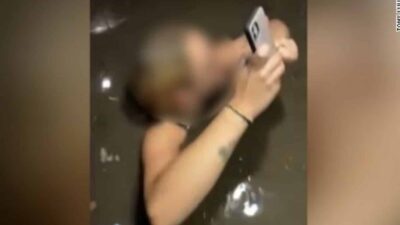 people trapped in flooded elevator