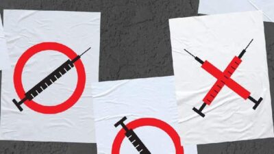 Anti-vaxxer - No to COVID Vaccine - Getty