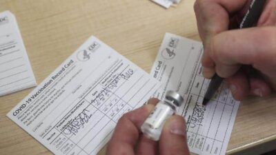 COVID-19 Vaccine - Vaccination Card - Getty