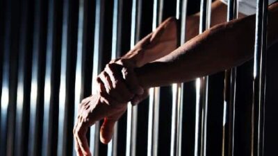 behind bars / jail cell / prison