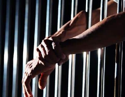 behind bars / jail cell / prison