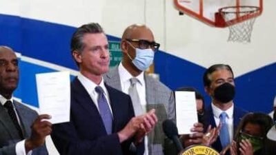 Gavin Newsom & supporters - police reform bill signing