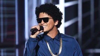 Bruno Mars singing on stage