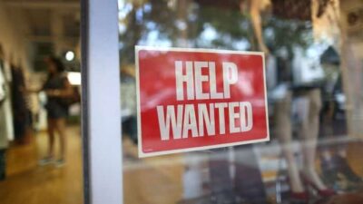 Jobs - Help Wanted sign in window