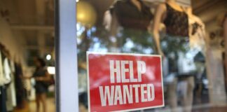 Jobs - Help Wanted sign in window