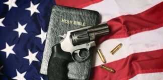 Christians and Guns American flag Bible revolver bulletts - Getty