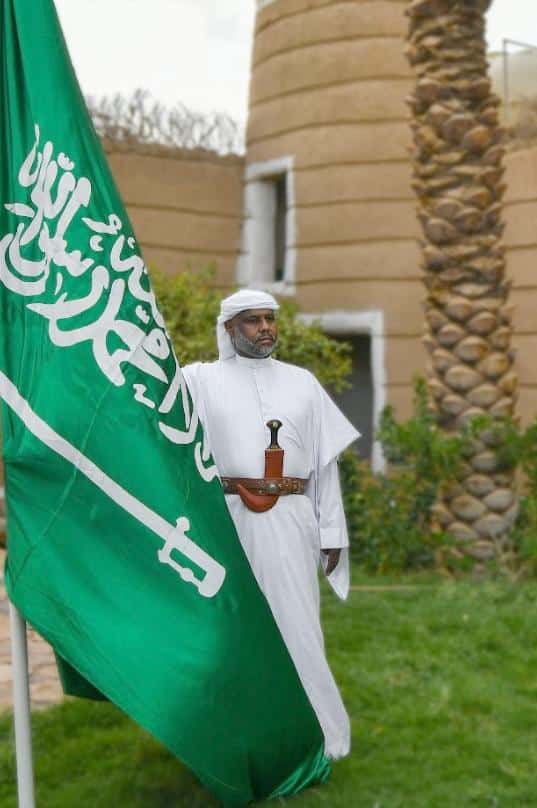 Saudi Arabian man (in white)