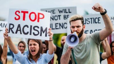 Stop Racism (white protestors) - iStock