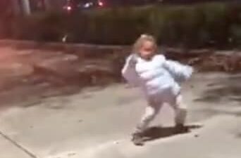 Girl dancing to marching band
