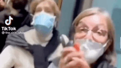 White women harassed unmasked Black man