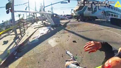 LAPD pulls pilot from crashed plane seconds before train smashes plane!