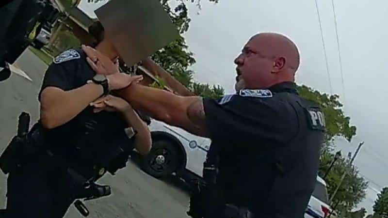 SGT Christopher Pullease grabs female officer by her throat - screenshot