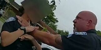SGT Christopher Pullease grabs female officer by her throat - screenshot
