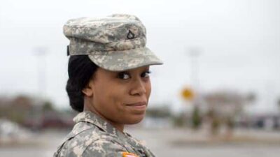 Close Portrait of Female Army Soldier / Getty