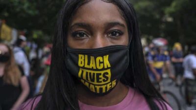 Black woman - Mask (Black Lives Matter) Getty
