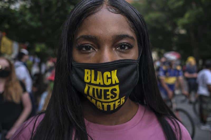 Black woman - Mask (Black Lives Matter) Getty
