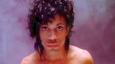 Prince in video for "When Doves Cry"