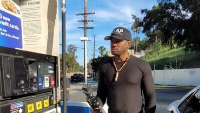 Black Man at Gas Pump (screenshot)