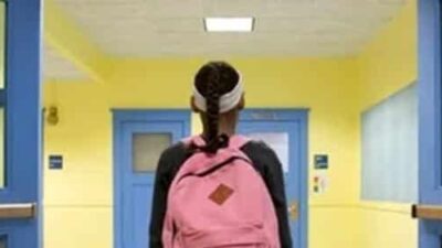 Black girl with backpack (Getty)