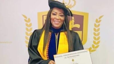 Jody Watley holding degree