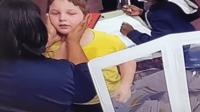 student choking in video